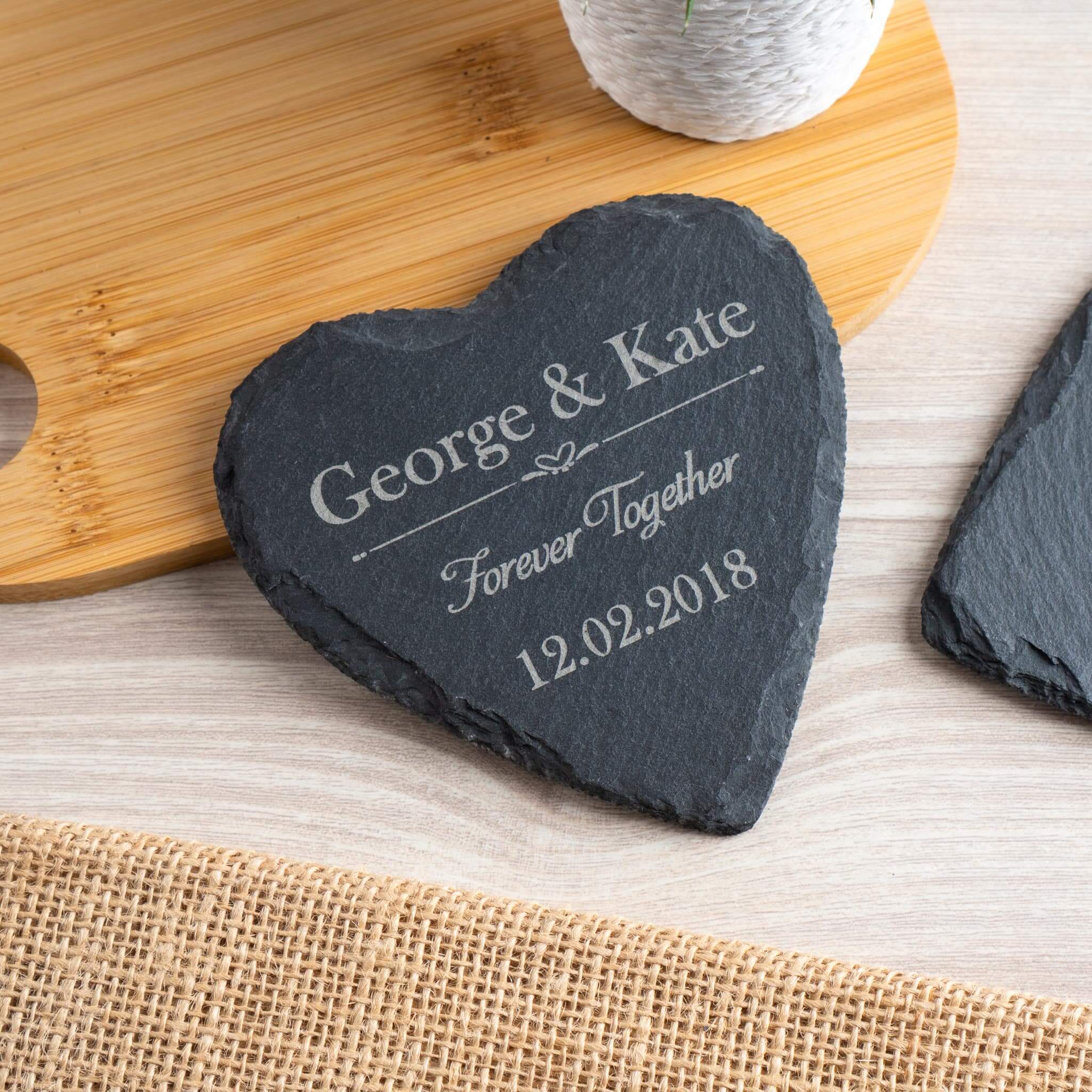 Personalised anniversary gift - heart slate coaster with engraved names and date.