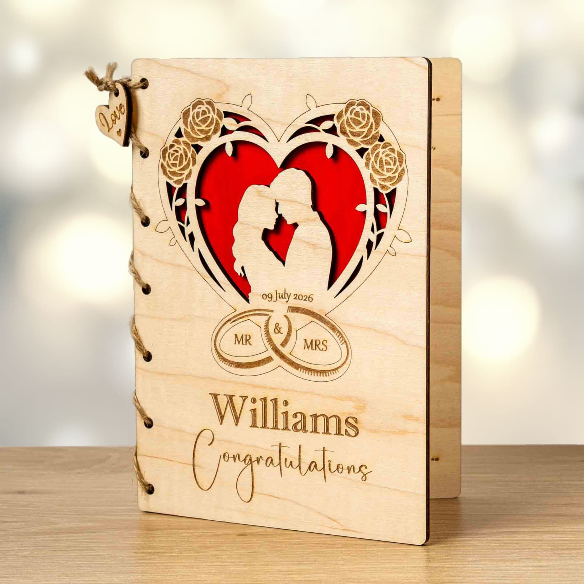 Personalised wooden wedding card featuring a couple silhouette and intricate heart design.