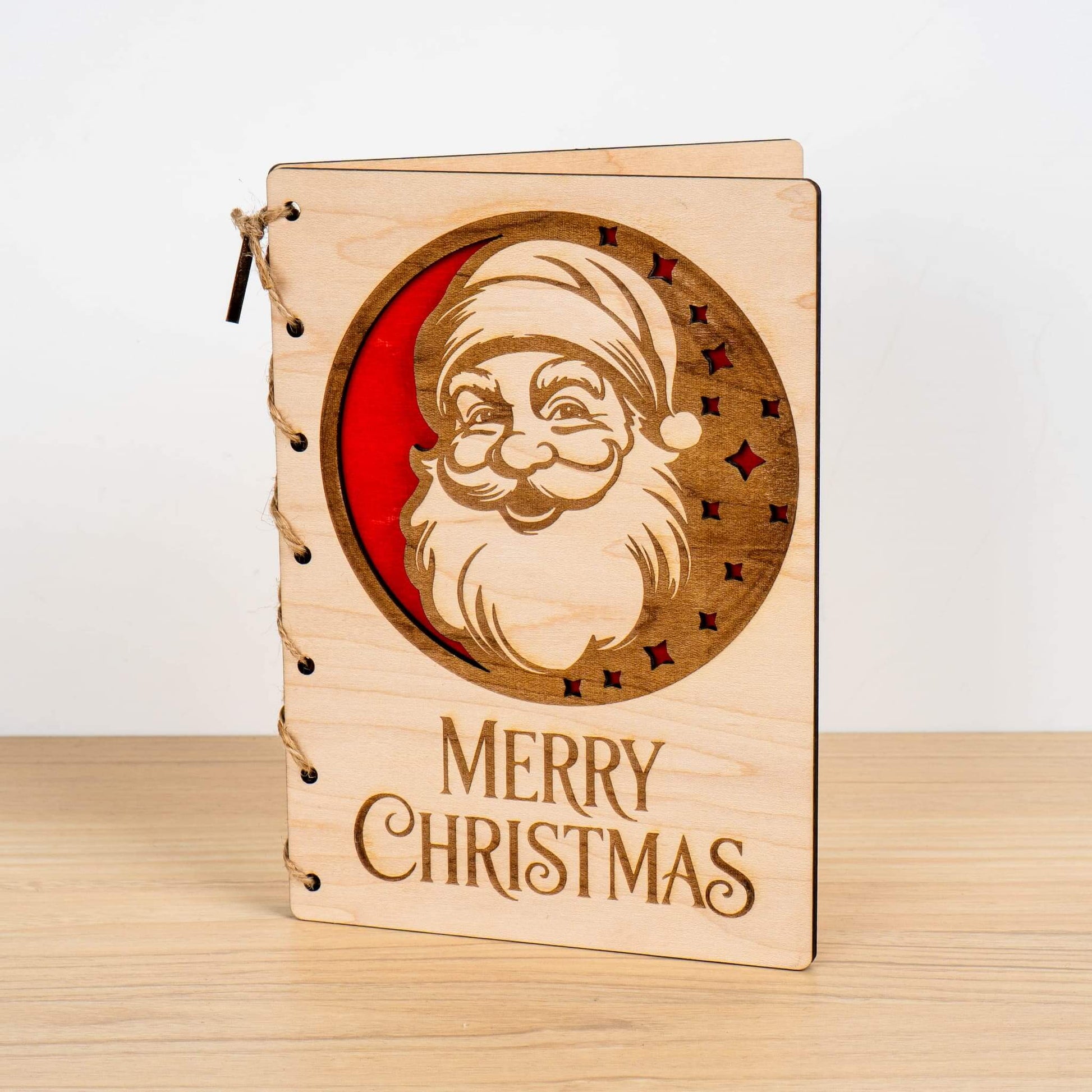 Personalised Christmas Card featuring an engraved Santa design with the words Merry Christmas.