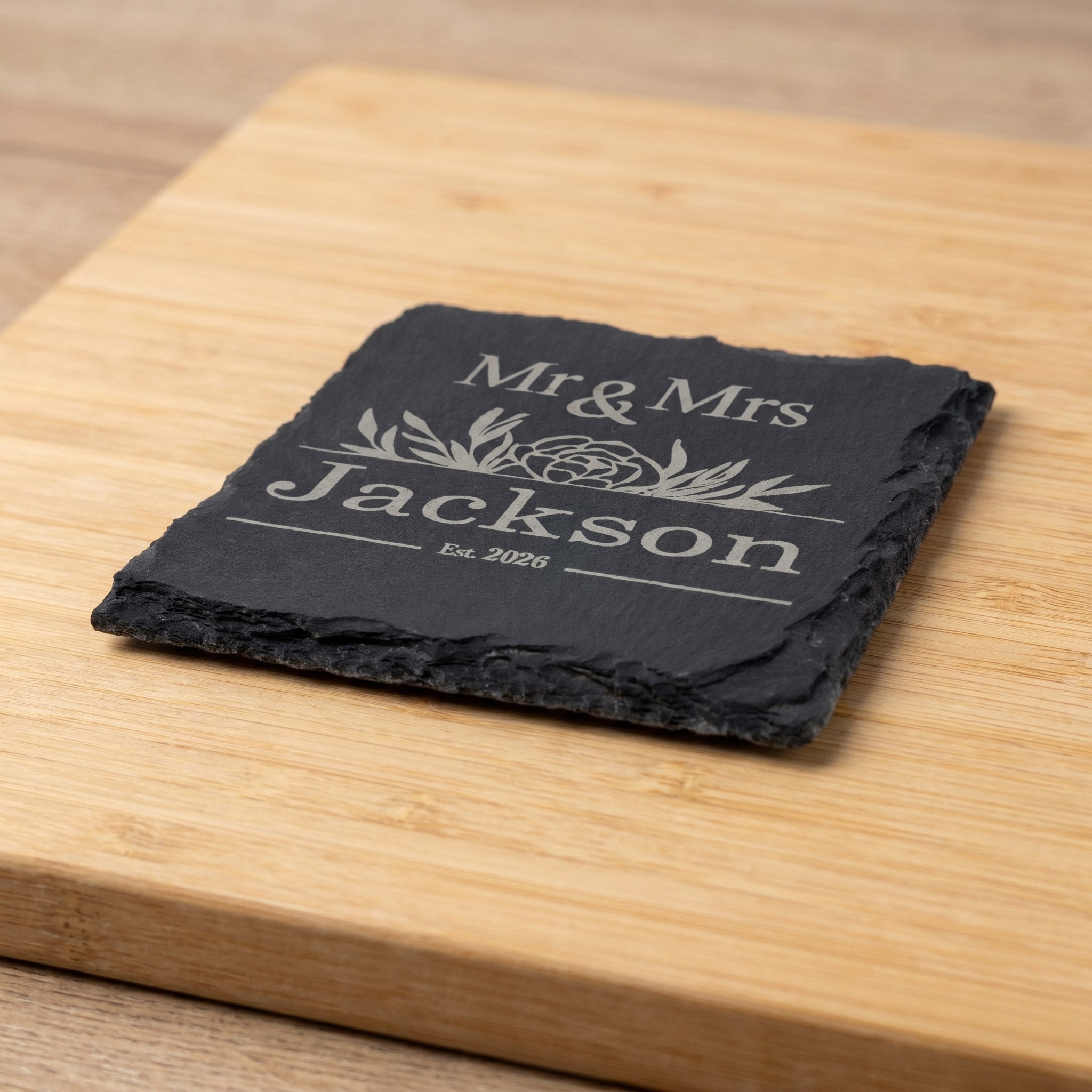 Personalised Slate Coaster Set featuring engraved design for Mr & Mrs Jackson on natural slate