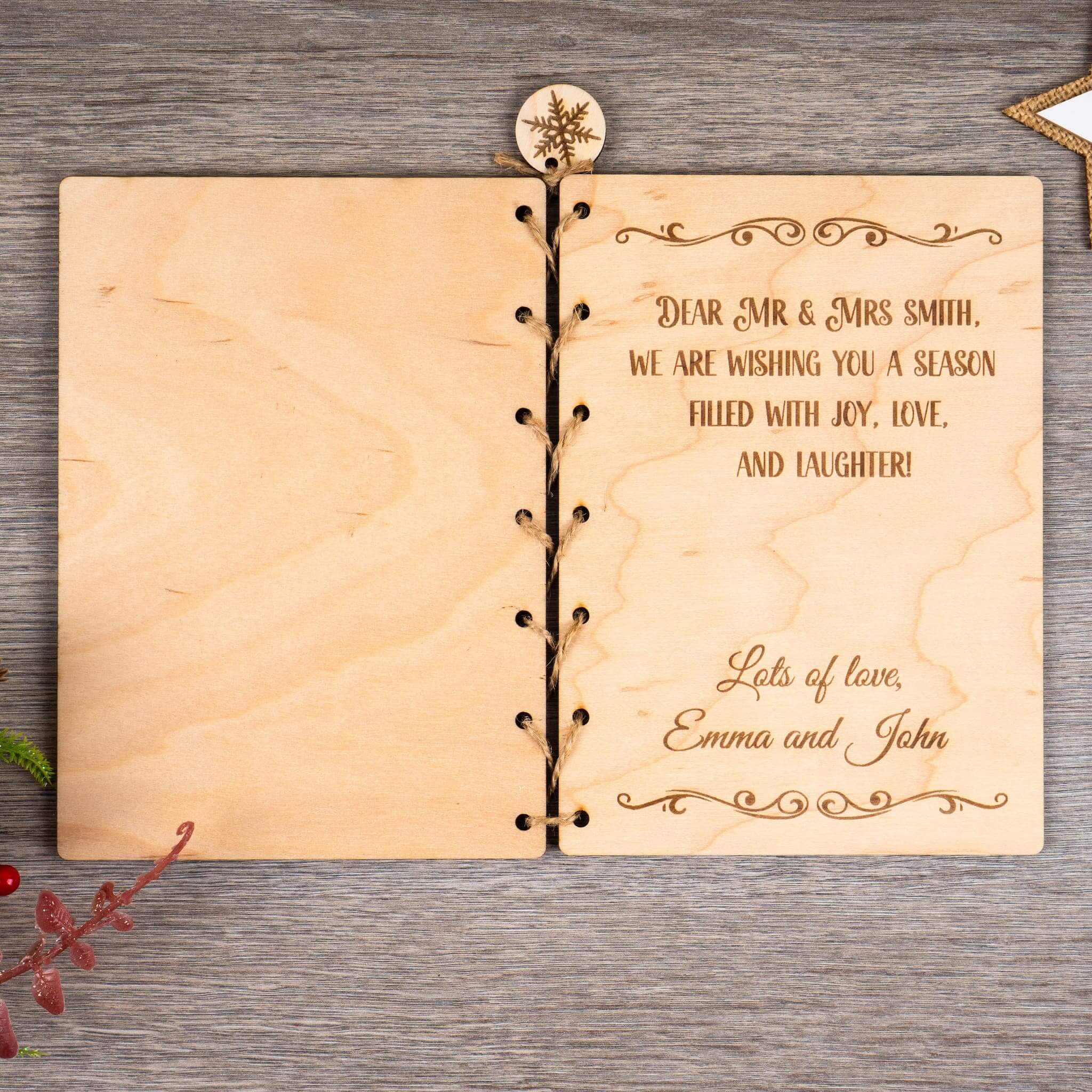 Open personalised Christmas card engraved with custom message for Mr & Mrs Smith, featuring joyful and loving wishes.