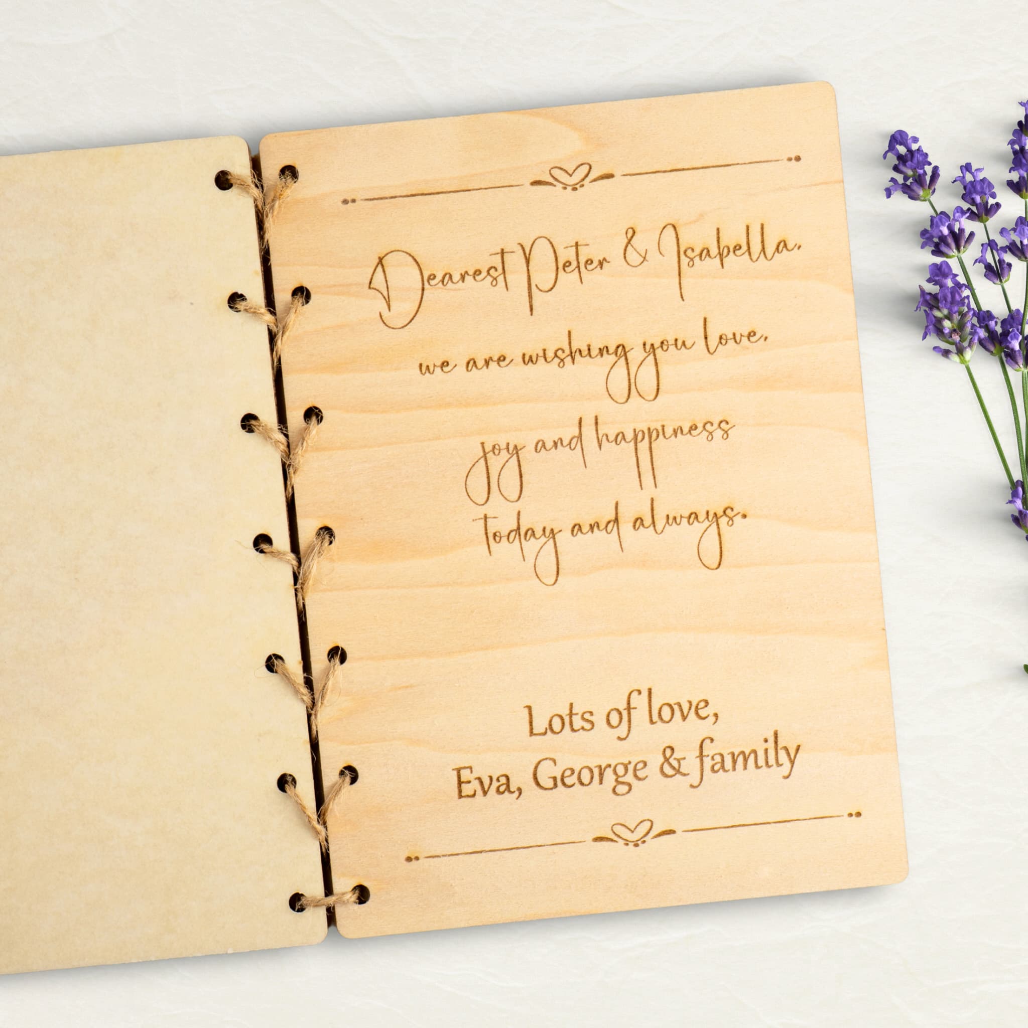 Personalised wedding card featuring engraved message for couple on wooden material.