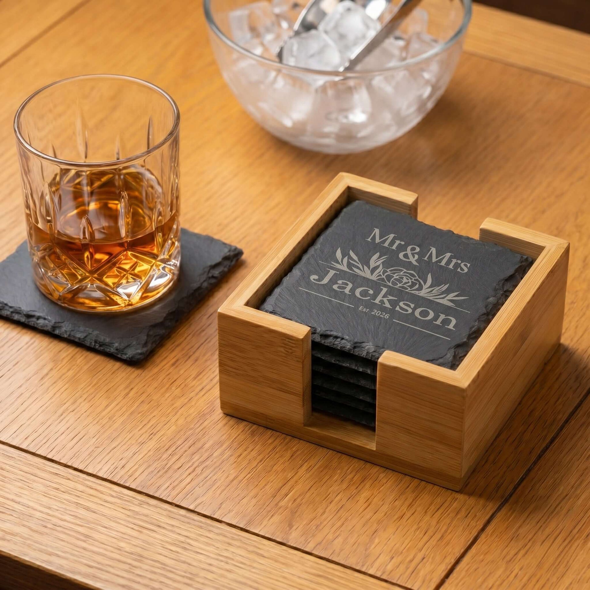 Personalised Slate Coaster Set with bamboo holder, featuring 'Mr & Mrs Jackson' on slate coasters, perfect wedding gift.