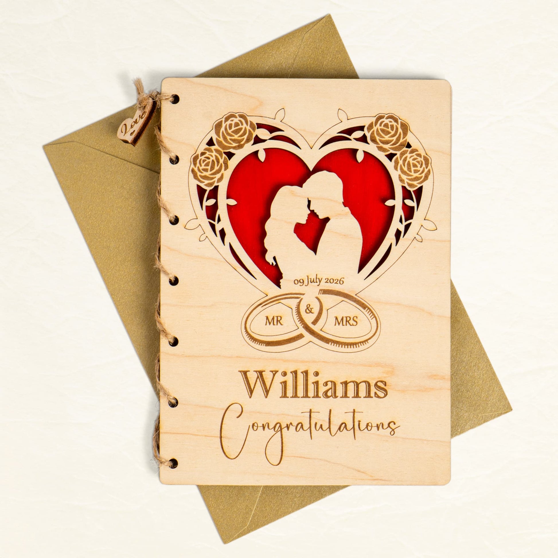 Personalised wooden wedding card featuring couple silhouette and floral design, perfect for celebrating love.