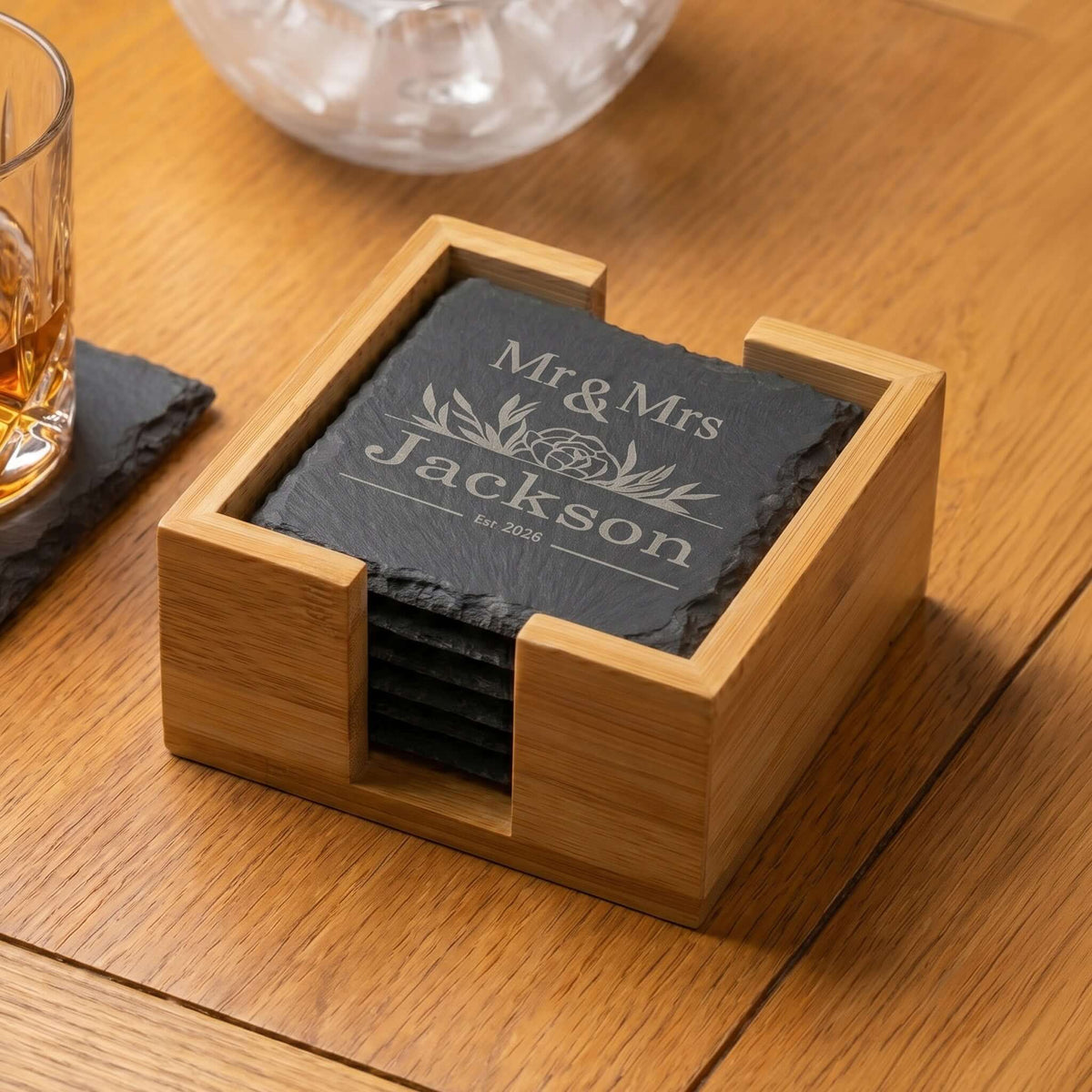 Personalised Slate Coaster Set with Holder featuring engraved Mr & Mrs design on natural slate coasters in bamboo holder.