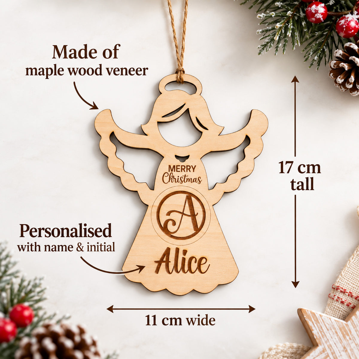 Personalised Wooden Angel Christmas Decoration featuring name and initial, made of maple wood veneer, measuring 17 cm tall and 11 cm wide.