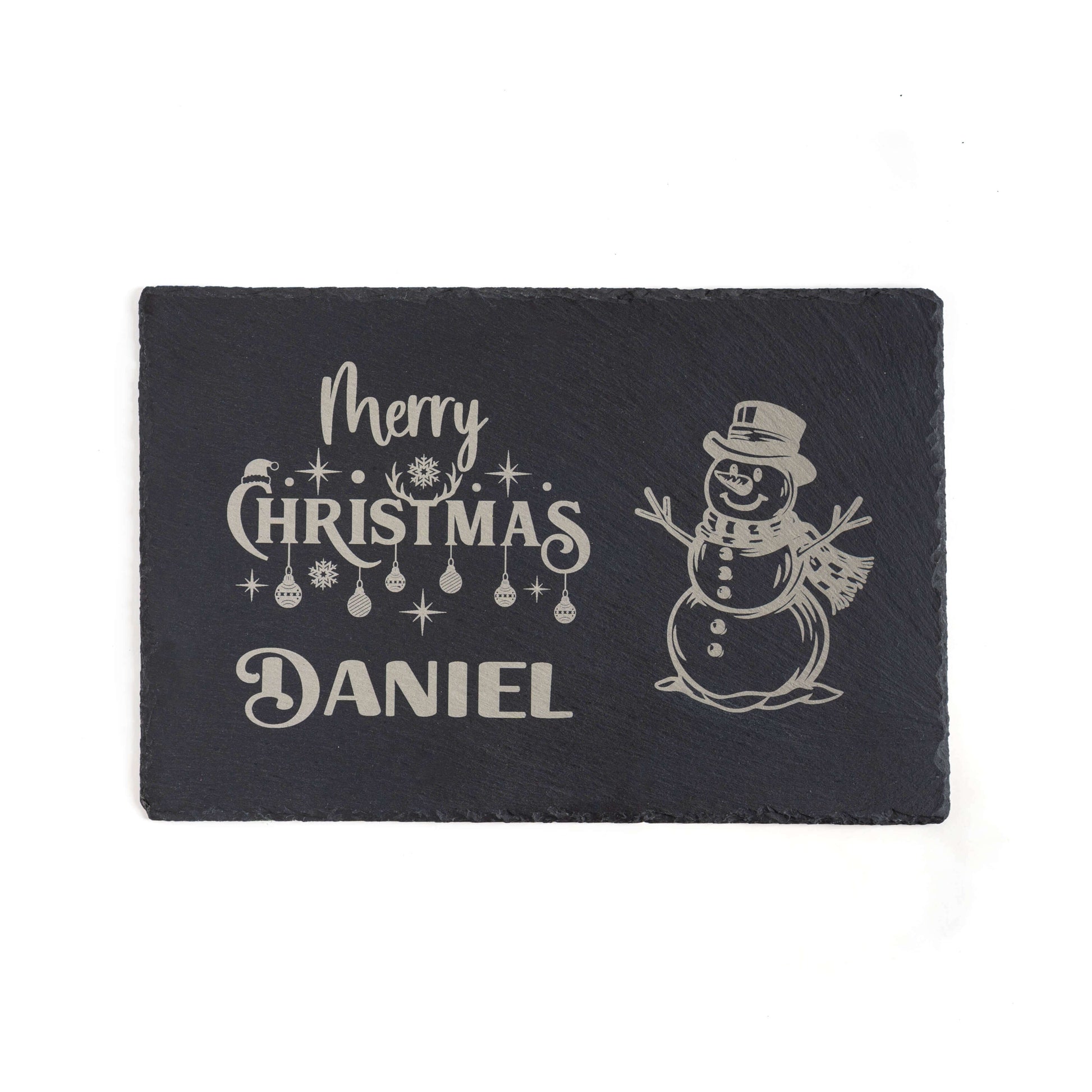 Personalised Christmas Placemat featuring engraved text 'Merry Christmas Daniel' with a snowman design.