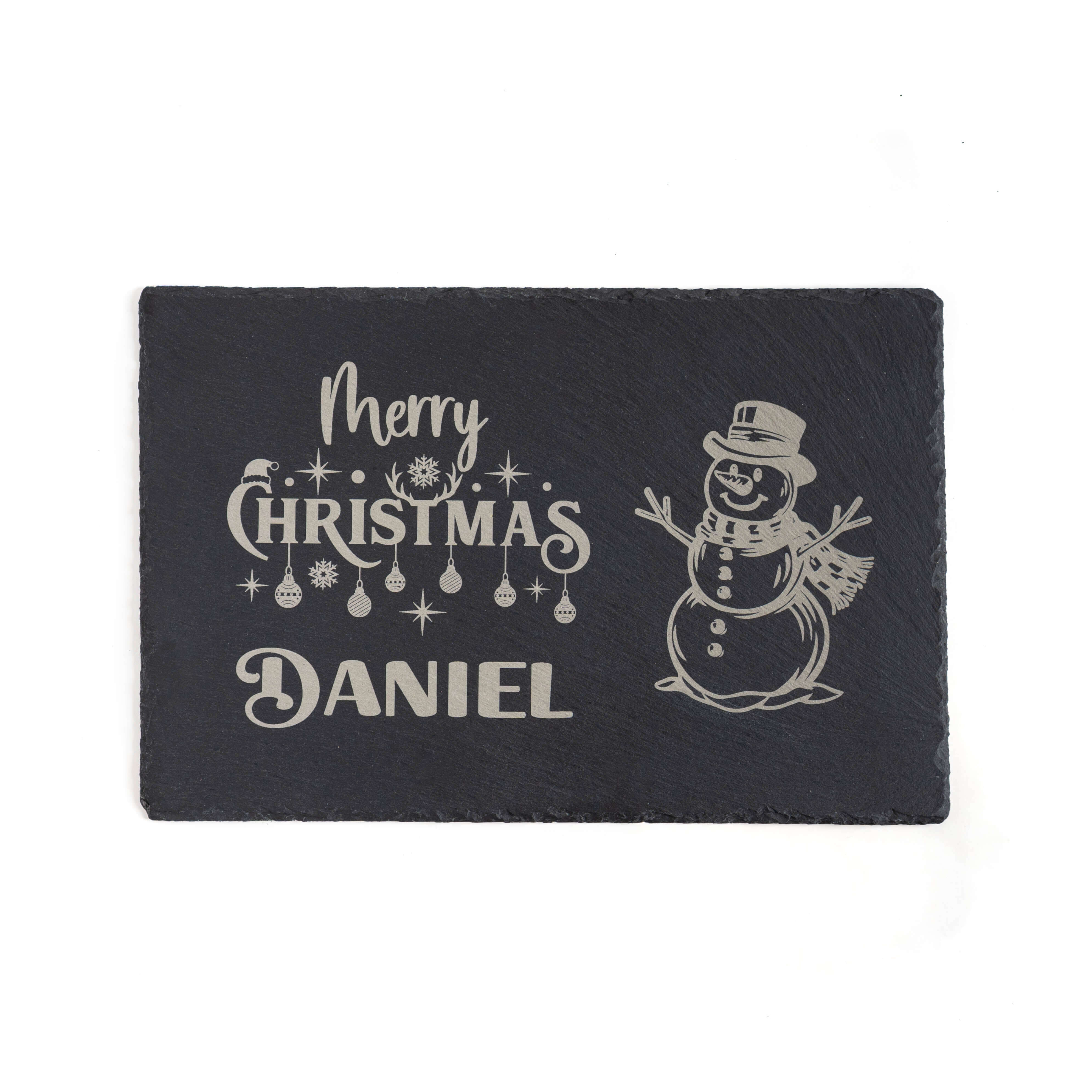 Personalised Christmas Placemat featuring engraved text 'Merry Christmas Daniel' with a snowman design.