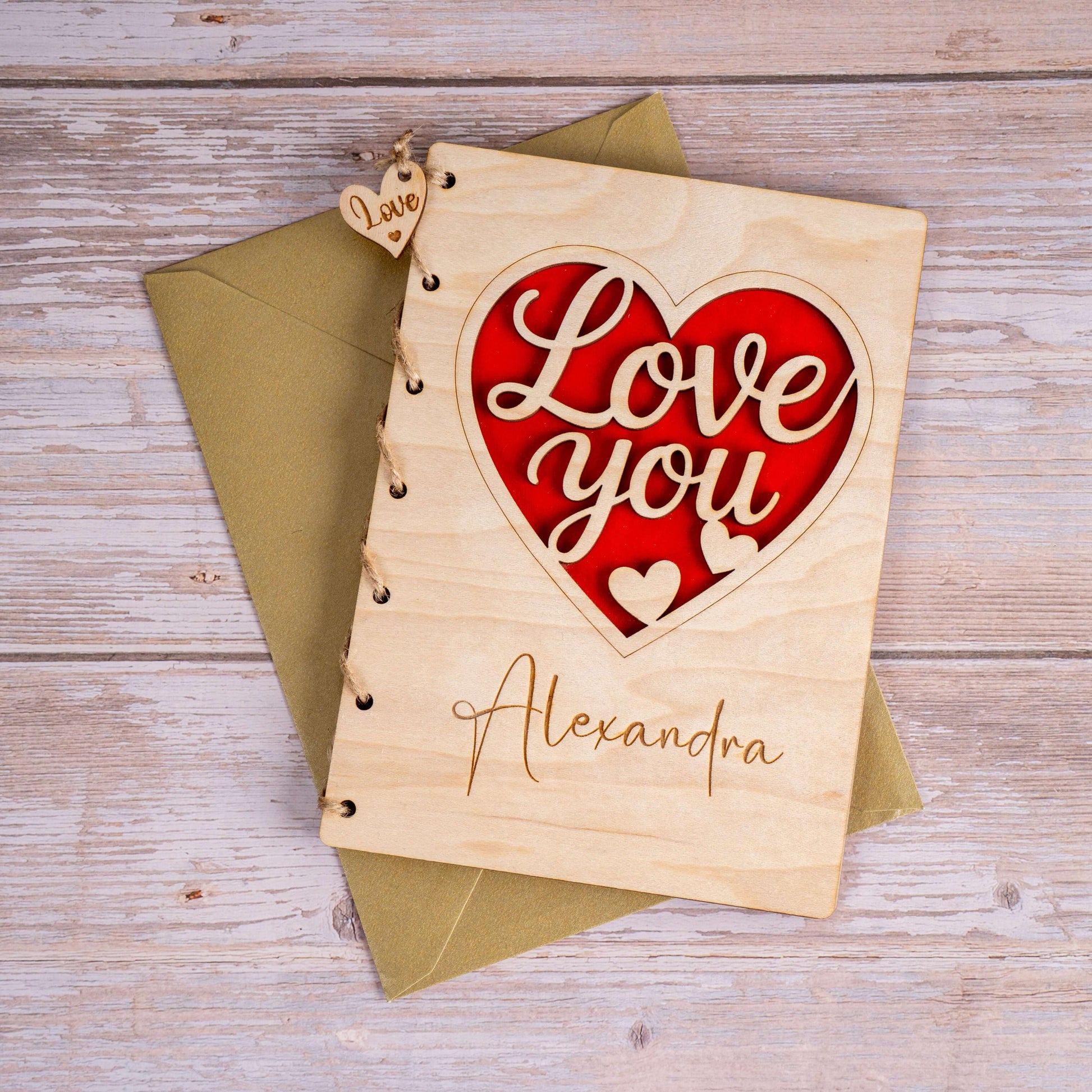 Personalized Wooden Card with 'Love You' design and red heart, custom engraved for special occasions.