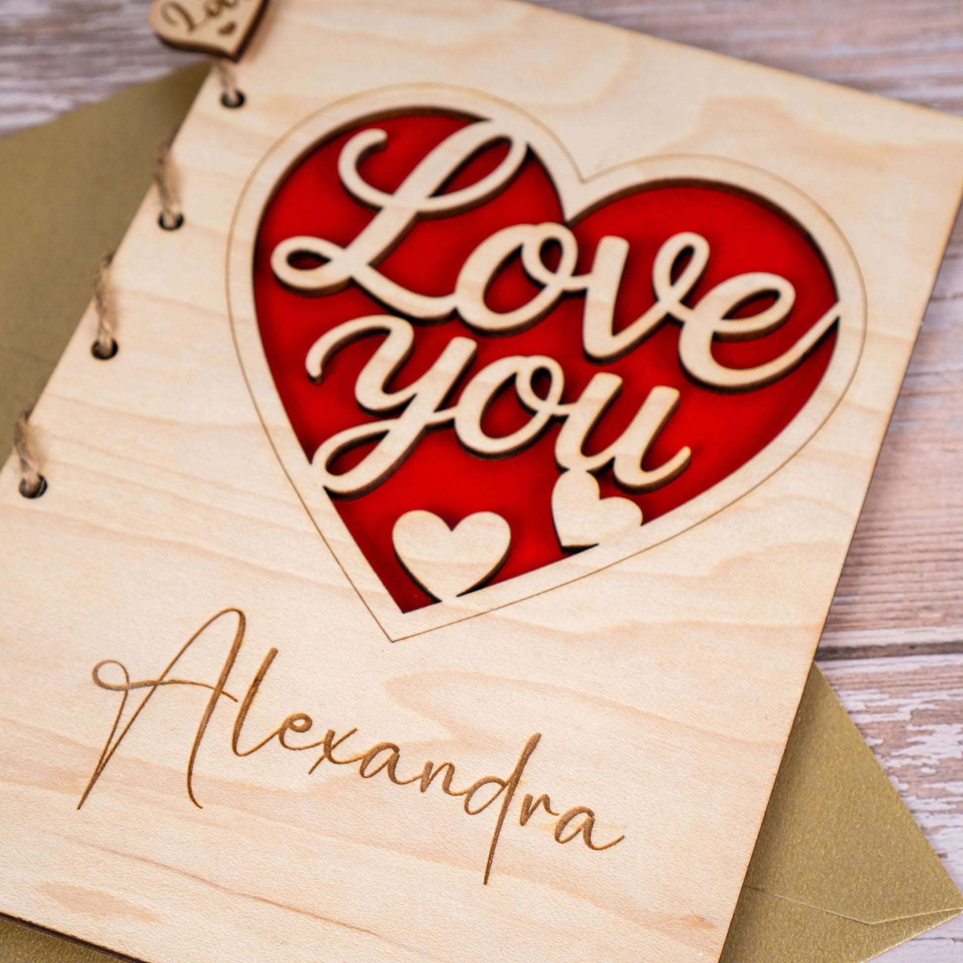 Personalized Wooden Card with 'Love You' design and custom name Alexandra, perfect for expressing love.