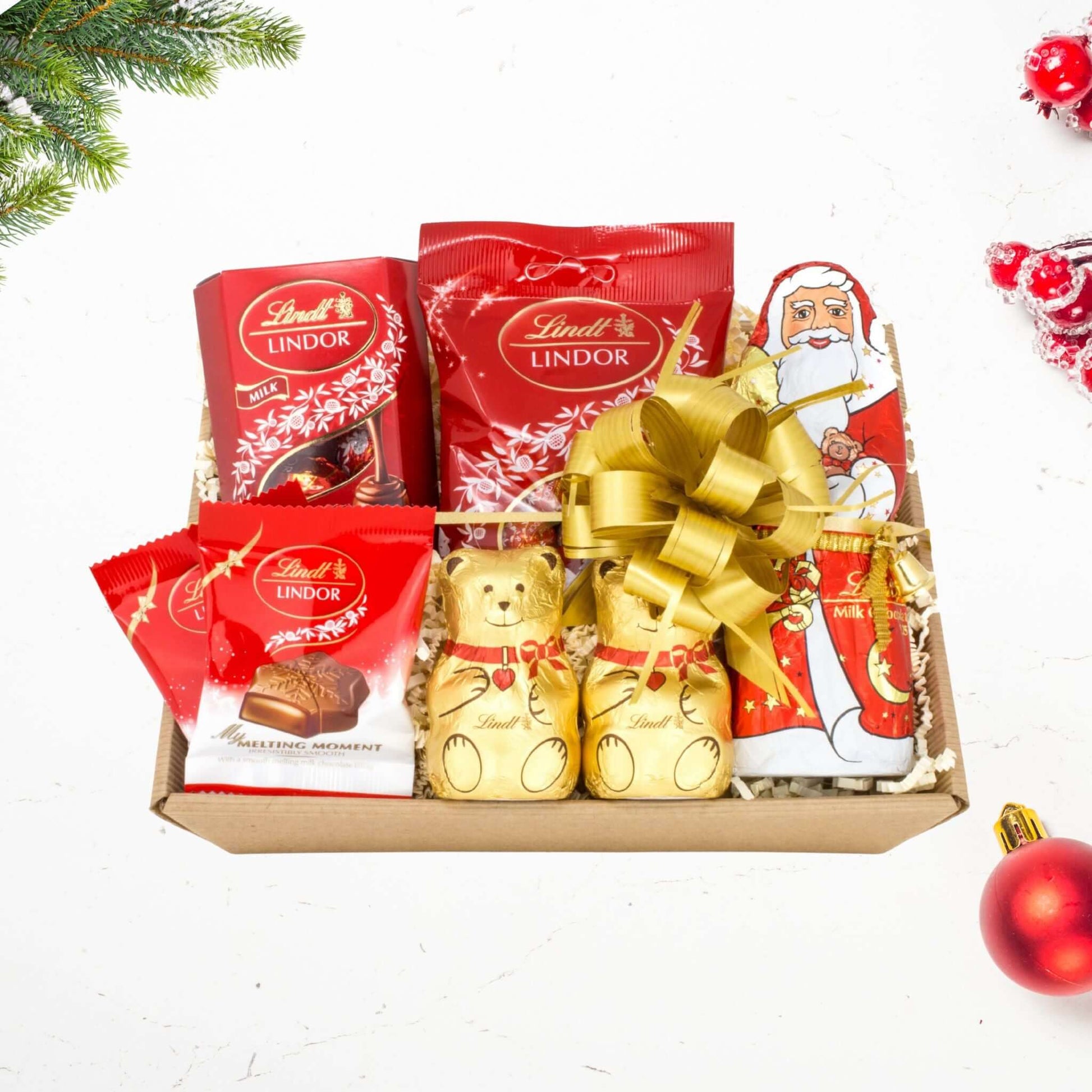 Christmas Lindt Chocolate Hamper featuring assorted Lindor chocolates in festive packaging.