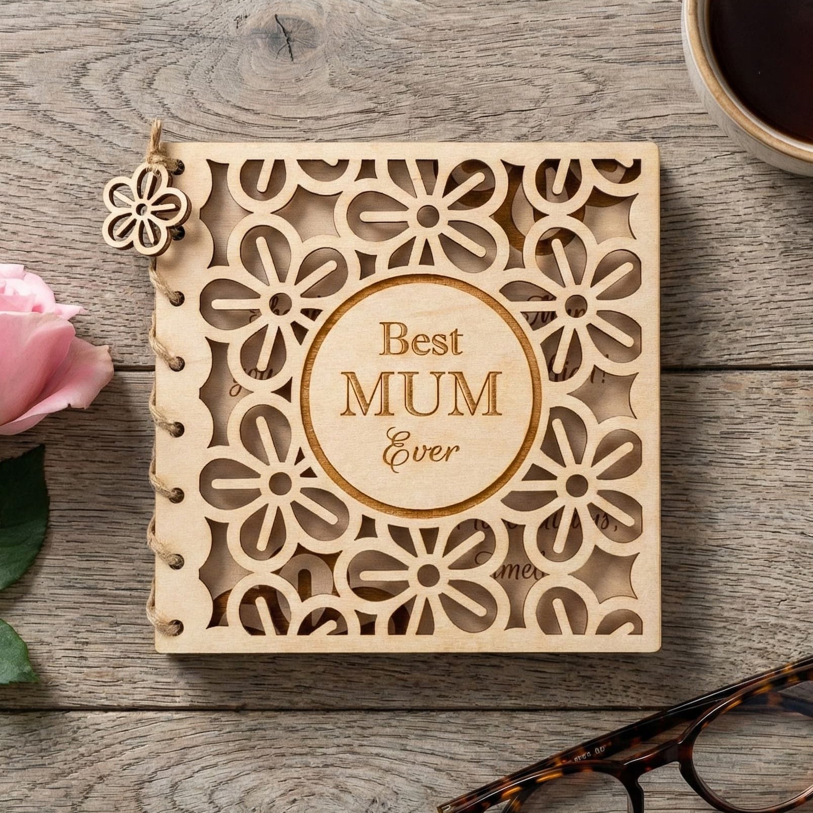 Personalised wooden Happy Mother's Day Card with floral design and inscription 'Best Mum Ever' on a rustic table.