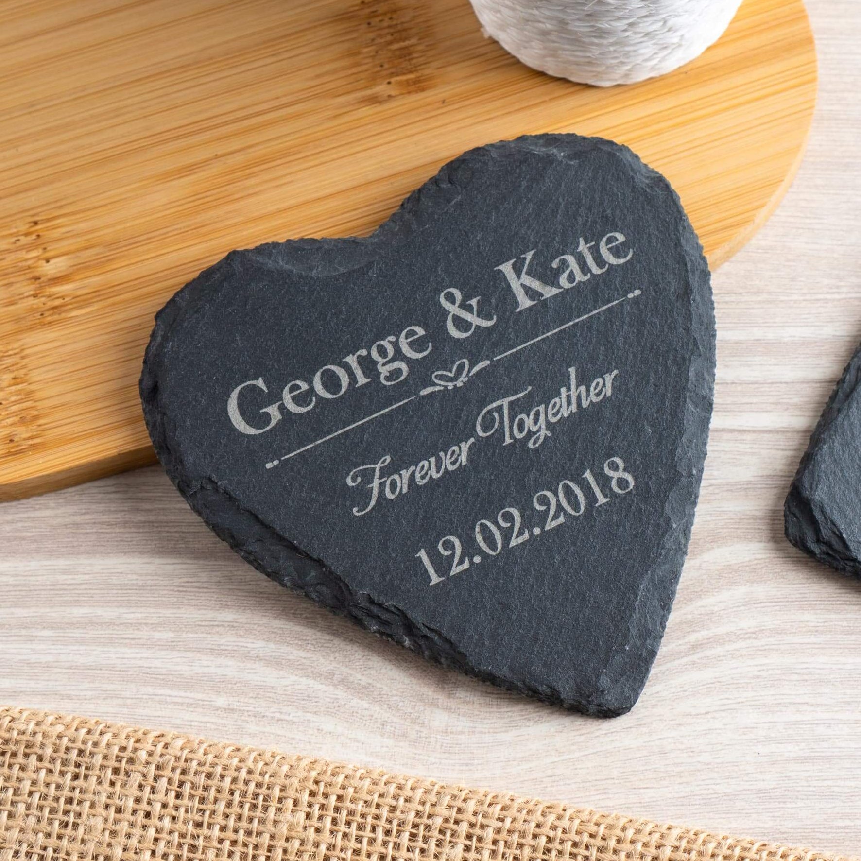 Personalised anniversary gift - heart slate coaster with engraved names and date.