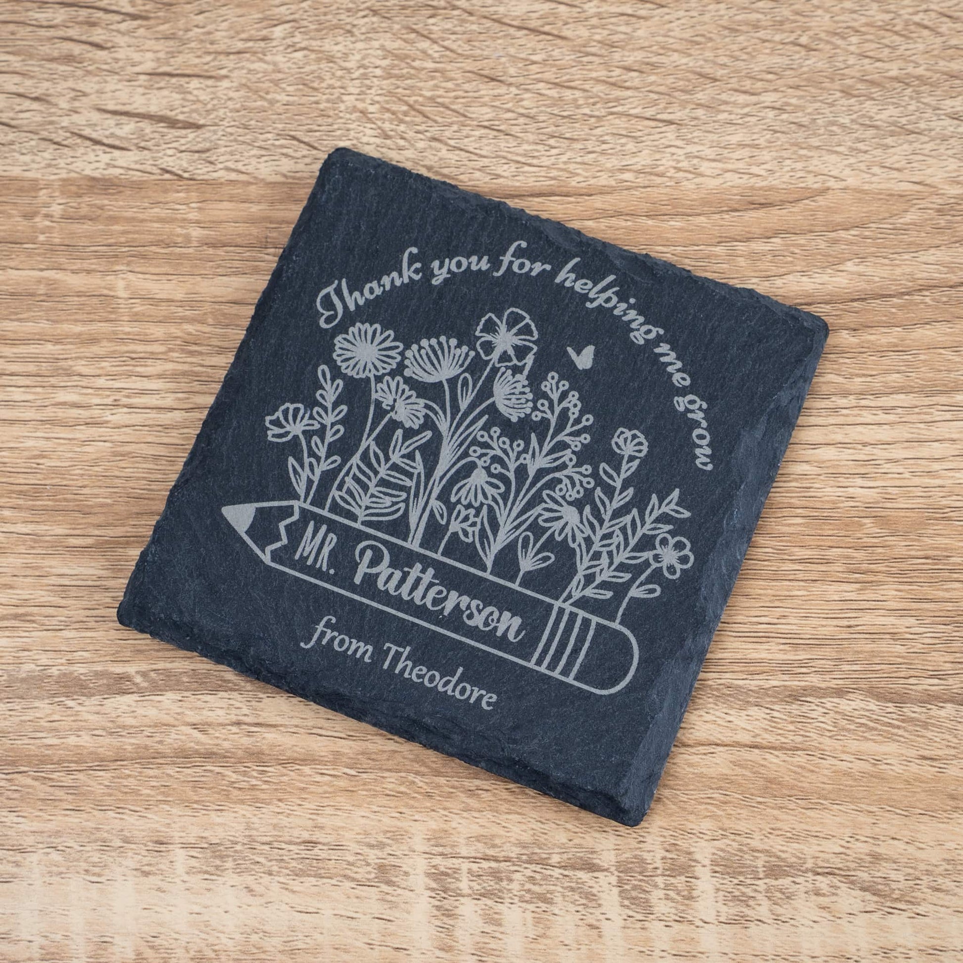 Personalised teacher slate coaster with floral design, thank you message for Mr. Patterson from Theodore.