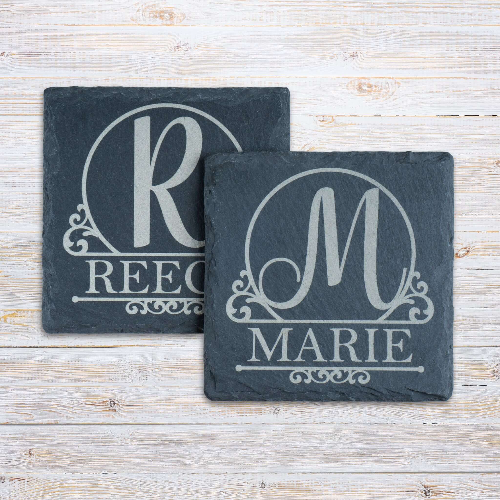 Personalised slate coasters with engraved initials 'R' and 'M' and names 'Reece' and 'Marie', perfect for gifting in the UK.