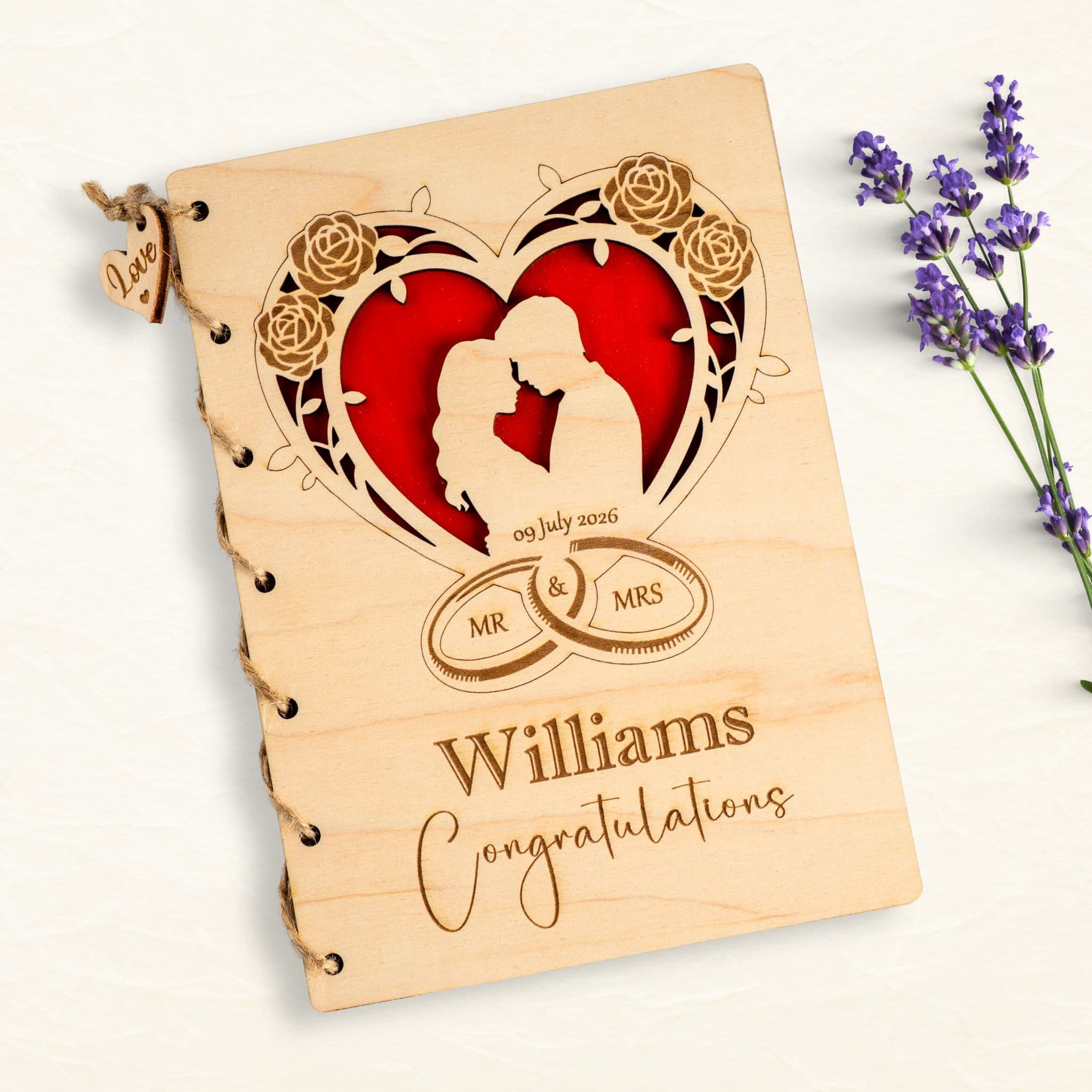 Personalised wooden wedding card featuring couple silhouette, hearts, and engraved details, perfect for celebrations.